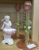 A pair of Venetian glass candlesticks and a Continental porcelain cherub