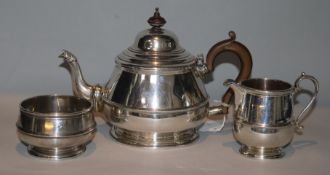A 1920's silver three piece tea set by Goldsmiths 7 Silversmiths Co Ltd, London, 1921, gross 25.5