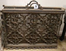 A French wrought and cast iron folding fire guard, W.3ft 8in.