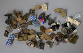 A collection of silver and novelty cufflinks.