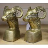 A pair of cast brass ram's head bookends, 6.5in.