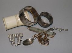A silver bracelet, silver napkin ring, fruit knife and other items.