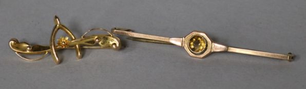 Two 9ct gold bar brooches, including one with citrine, largest 49mm.