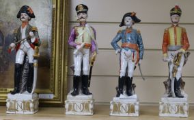 A set of four Capo di Monte style Napoleonic officers, tallest 33cm