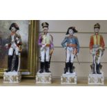 A set of four Capo di Monte style Napoleonic officers, tallest 33cm