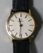 A lady's 9ct gold Omega manual wind wrist watch.