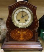 A mahogany mantel clock