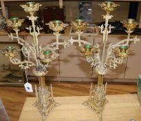 A pair of French gilt metal gothic style candelabra, 22in.