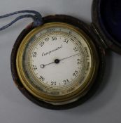 A cased pocket barometer