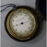 A cased pocket barometer