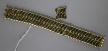 A part 14ct gold expanding bracelet, with spare links, 39 grams gross.