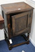 A pair of carved oak pot cupboards 1ft 6in.