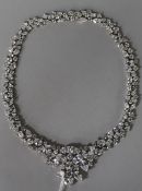 A silver and cubic zirconia set necklace.