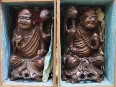 Two Chinese hardwood carvings, boxed, 12in.