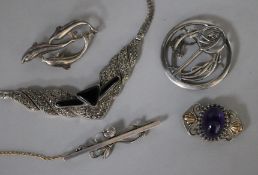 A Georg Jensen silver brooch, no. 278, three other silver brooches including amethyst set and a