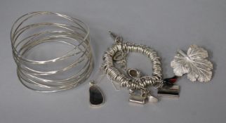 A Links of London silver bracelet and three other items including a silver pendant.