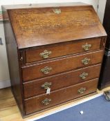 A George III oak bureau 3ft 1in.