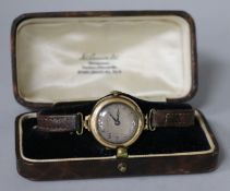 A gentleman's early 20th century 9ct gold manual wind wrist watch.