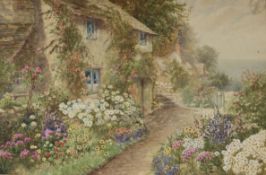Wilfred Holmes (19th/20th century)watercolourA Devonshire Gardensigned, Maple & Co label verso11.5 x