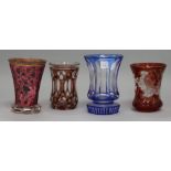 Four 19th century Bohemian glass beakers