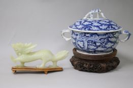 A Chinese blue and white bowl and cover, wood stand