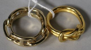 Two Hermes scarf rings.