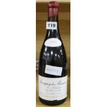 A bottle of 2003 Domaine Leroy Les Narbantons Savigny-Les Beaune Premier Cru champagne