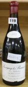A bottle of 2003 Domaine Leroy Les Narbantons Savigny-Les Beaune Premier Cru champagne