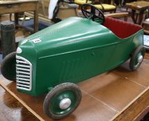 A child's pedal car