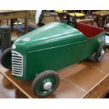 A child's pedal car