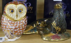 A Royal Crown Derby figures of a sea lion and an owl, both boxed