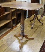 An early 19th century mahogany tripod table