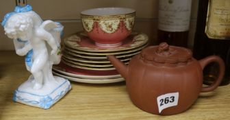 Eight worcester plates, a bowl and a Yixing teapot.
