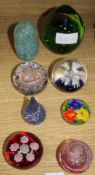 A collection of eight paperweights