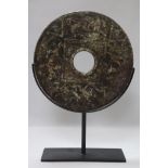 A large Chinese stone bi disc with stand, Dia.30cm not including stand