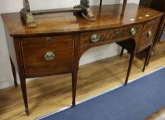 A George III mahogany bowfront sideboard