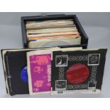 A Record Box containing a quantity of 1960's-70's 7 inch singles