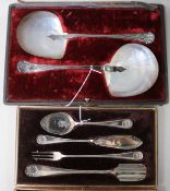 A pair of Dixon mother-of-pearl spoons with plated handles, cased, and a set of cased plated