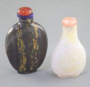 A Chinese carved opal snuff bottle and tiger's eye mineral snuff bottle, early 20th century the opal