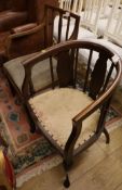 An Edwardian mahogany tub shaped elbow chair and one other
