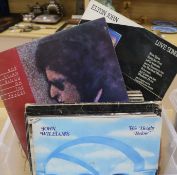 A box of mixed LP's containing King Crimson, John Lennon, Bob Dylan, Leonard Cohen, etc.