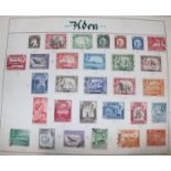 An all world collection of stamps in a large ledger