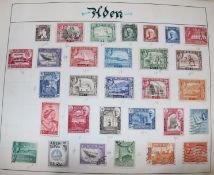 An all world collection of stamps in a large ledger