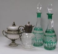 Two overlaid green glass decanters, a jug and a sweet dish