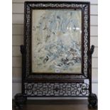 A Chinese hardwood framed fire screen, Emb. panel H.52cm,W.41cm