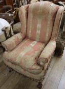A Chippendale style mahogany wing armchair