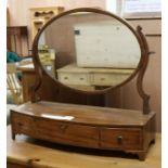 A George III mahogany toilet mirror, W.2ft