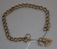 A 9ct gold curb link bracelet, 22.6 grams.