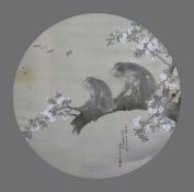 A Japanese watercolour on silk of two monkeys, Meiji period, tondo, the two simians seated on a