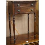 A Regency mahogany two drawer work table, on slender turned legs W.1ft 7in.